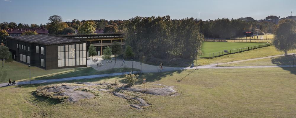 Vy utbyggd del servicebyggnad Gubbängens sportfält. Visionsbild: Ahlsénarkitekterna